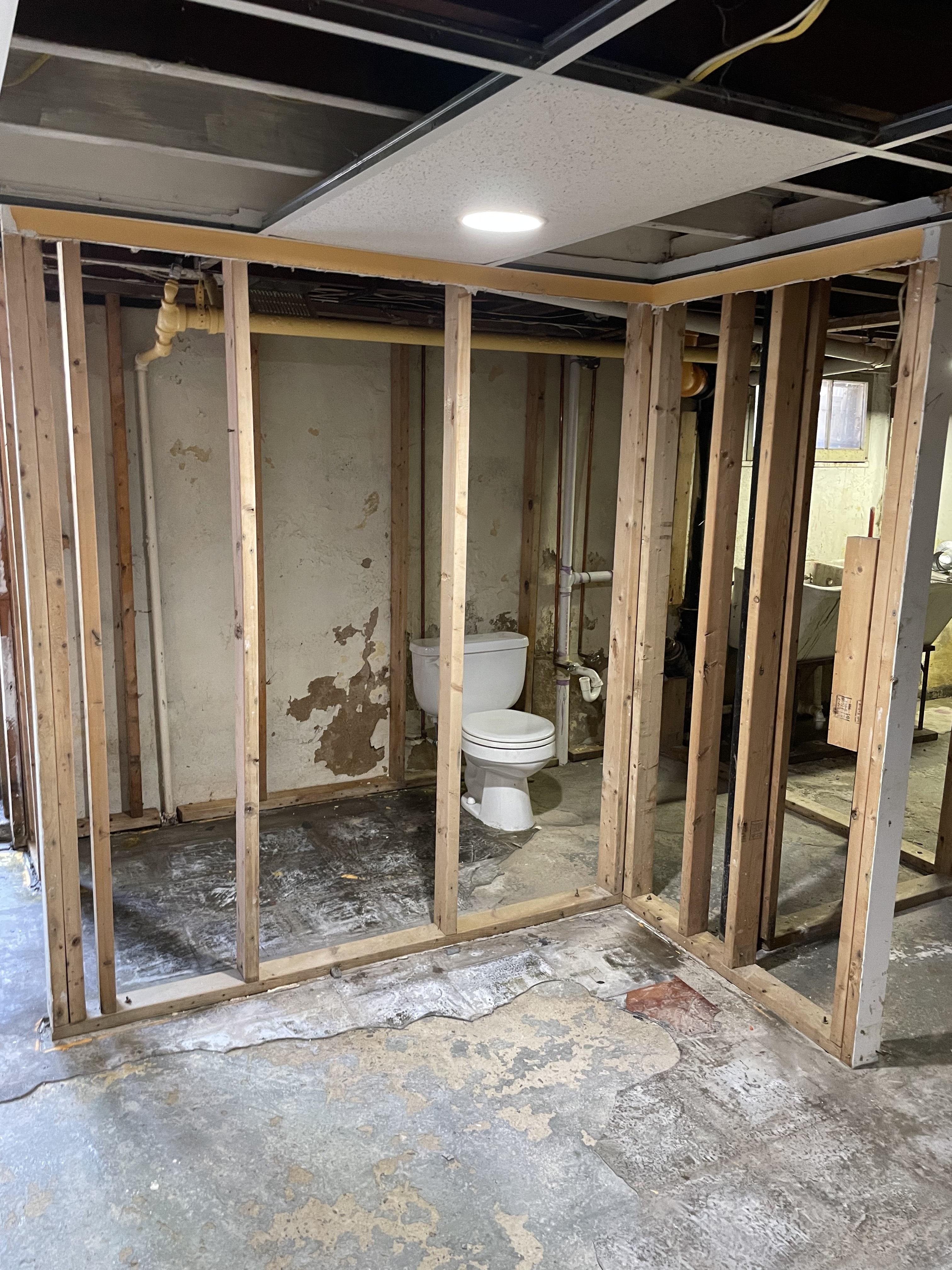 Bathroom demolition during water damage restoration in a New Jersey home
