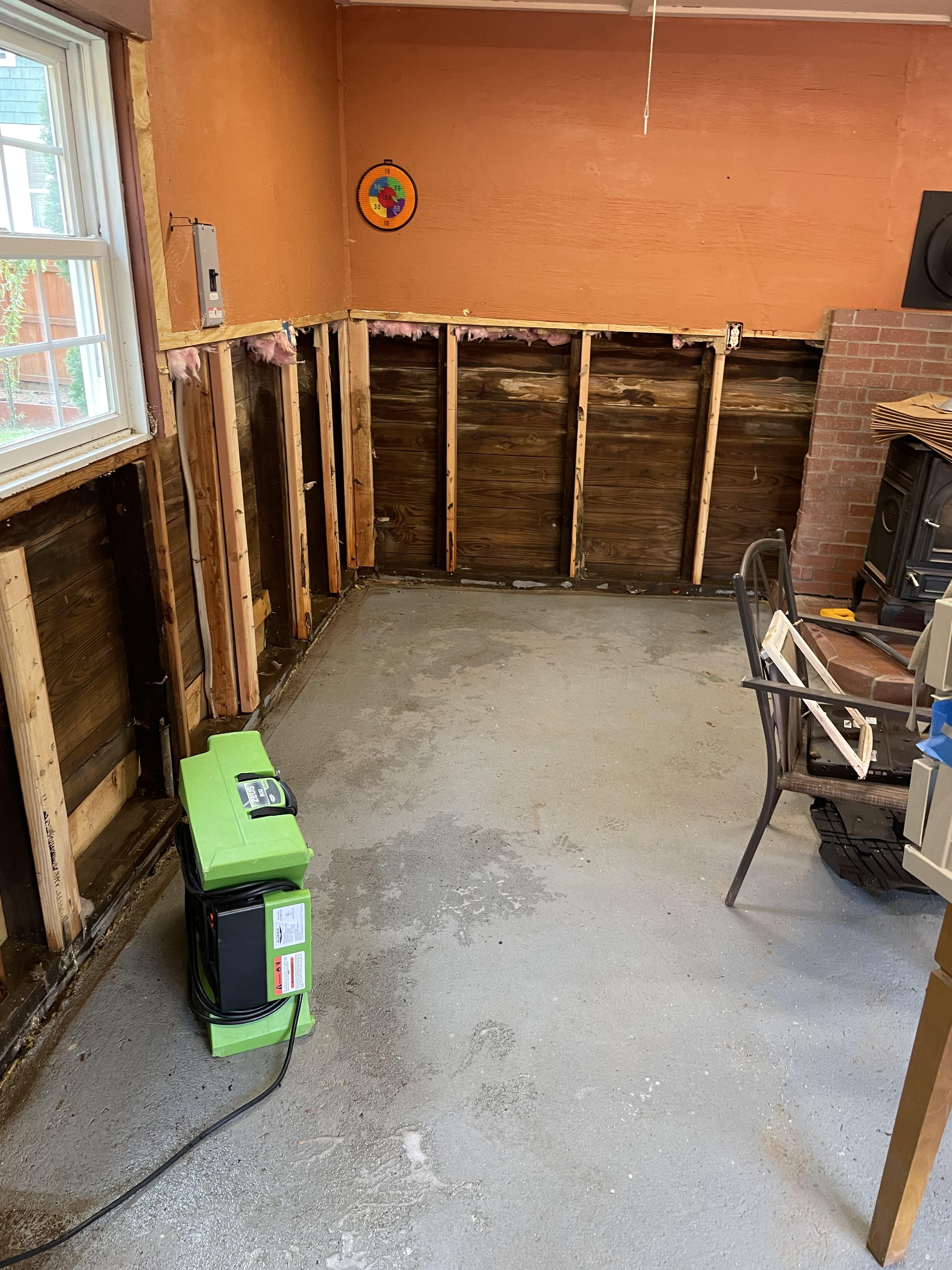 Drywall demolition and restoration progress in a fire-damaged NJ property